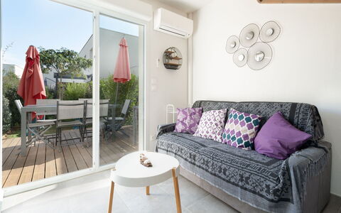 La Dune: Furniture, Interior Design, Flooring, Floor, Couch, Apartment, Home, Room, Table, Living Room