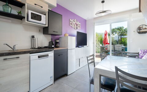 La Dune: Furniture, Wood, Interior Design, Flooring, Kitchen, Cabinetry, Floor, Room, Major Appliance, Cupboard