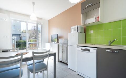 La Dune: Furniture, Wood, Interior Design, Flooring, Kitchen, Cabinetry, Floor, Room, Major Appliance, Cupboard