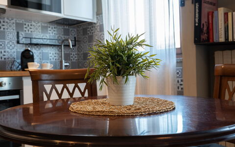 La Casa del Saggio: Furniture, Interior Design, Wood, Table, Flowerpot, Lighting, Flooring, Tableware, Kitchen & Dining Room Table, Dining Room