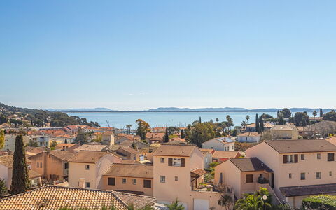 Lou Gangui: Sky, Blue, Daytime, Horizon, Coast, Tropics, Resort Town