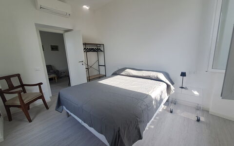 Central Design Flat With Parking, Bogliasco: Furniture, Bed, Floor, Bedroom, Flooring, Interior Design, Bed Sheet, Bedding, Wood, Room
