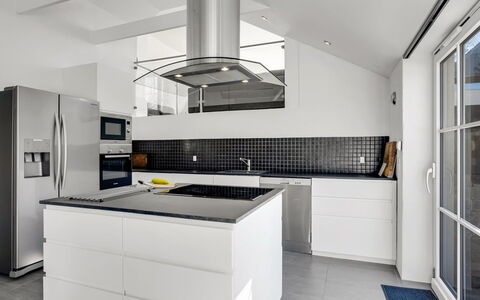 Judit - 10M from the Sea: Kitchen, Countertop, Kitchen Appliance, Interior Design, Flooring, Cabinetry, Ceiling, Major Appliance, Floor, Light Fixture