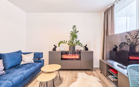 Klára: Furniture, Interior Design, Flooring, Wall, Couch, Floor, Wood, Room, Living Room, Home
