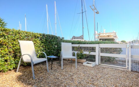 Les Rivages D'Ulysse: Awning, Shade, Balcony, Chair, Outdoor Furniture, Outdoor Structure, Outdoor Table, Pergola, Courtyard, Houseplant