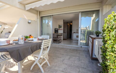 Les Rivages D'Ulysse: Awning, Shade, Balcony, Chair, Outdoor Furniture, Outdoor Structure, Outdoor Table, Pergola, Courtyard, Houseplant