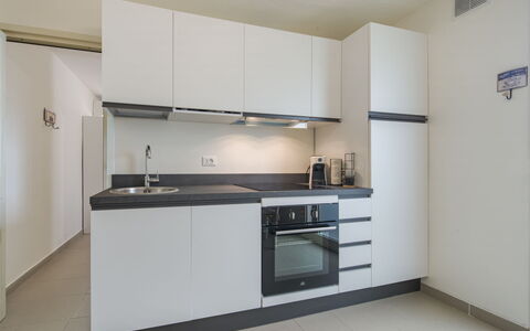 Casa Giuditta: Kitchen, Kitchen Appliance, Countertop, Major Appliance, Cabinetry, Interior Design, Flooring, Kitchen Stove, Floor, Room