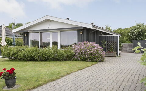 Cornelius - 30M from the Sea: House, Roof, Home, Shrub, Cottage, Estate, Shade, Garden, Yard, Siding