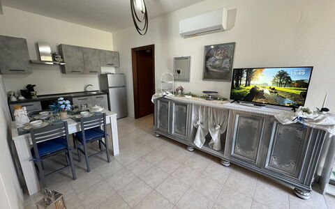 Il Volo Del Nibbio: Furniture, Flooring, Floor, Interior Design, Apartment, Chair, Room, Living Room, Couch