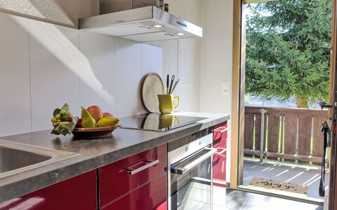 Chalet Träumli: Kitchen, Countertop, Kitchen Appliance, Interior Design, Cabinetry, Flooring, Major Appliance, Wood, Furniture, Kitchen Sink