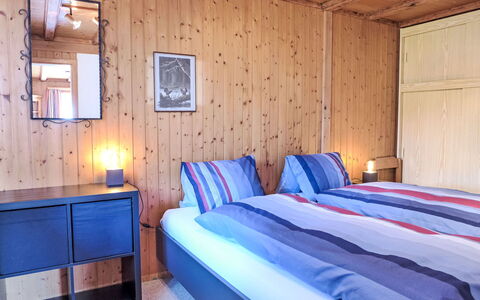 Chalet Träumli: Furniture, Interior Design, Wood, Bedroom, Room, Bed, Ceiling, Floor, Flooring, Bed Sheet