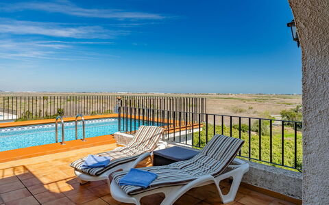 Los Delfines: Apartment, Furniture, Residential Area, Balcony, Condominium, Chair, Shade, Resort, Coast, Hotel