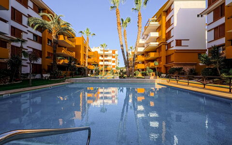La Recoleta: Apartment, Furniture, Residential Area, Balcony, Condominium, Chair, Shade, Resort, Coast, Hotel