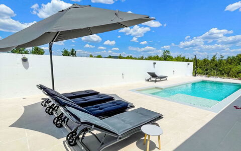 Olivarum: Outdoor Furniture, Furniture, Swimming Pool, Umbrella, Chair, Sunlounger, Composite Material, Shade, Outdoor Table, Leisure