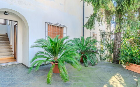 Mariarosa: Apartment, Furniture, Residential Area, Balcony, Condominium, Chair, Shade, Resort, Coast, Hotel