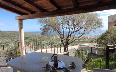 Belvedere Apartment Ac, Budoni: Furniture, Table, Chair, Outdoor Furniture, Outdoor Table, Kitchen & Dining Room Table, Porch, Wood Stain, Balcony, Mountain Range