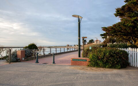 Les Gobions: Sky, Street Light, Walkway, Fence, Pole, Ocean, Sidewalk, Coast, Path, Home Fencing