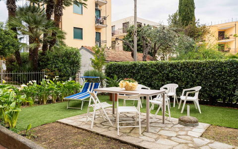 Casa del Mare: Furniture, Shrub, Outdoor Furniture, Garden, Chair, Shade, Lawn, Yard, Backyard, Landscaping