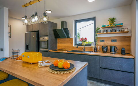 Villa Noel: Kitchen, Countertop, Interior Design, Wood, Furniture, Flooring, Cabinetry, Kitchen Appliance, Ceiling, Home Appliance