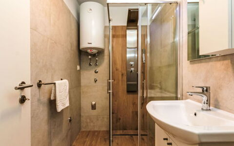 Paola: Bathroom, Plumbing Fixture, Bathroom Sink, Flooring, Wall, Floor, Interior Design, Toilet, Sink, Tap