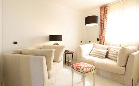 Villino Sonia: Furniture, Interior Design, Couch, Wall, Living Room, Wood, Flooring, Room, Floor, Textile