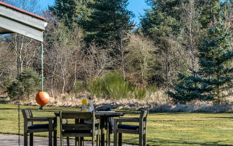 Thorvor - 400M from the Sea: Tree, Furniture, Outdoor Furniture, Shrub, Garden, Chair, Trunk, Shade, Sunlight, Lawn