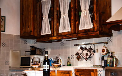 Ettore: Wood, Interior Design, Kitchen, Cabinetry, Lighting, Furniture, Countertop, Brown, Light Fixture, Room