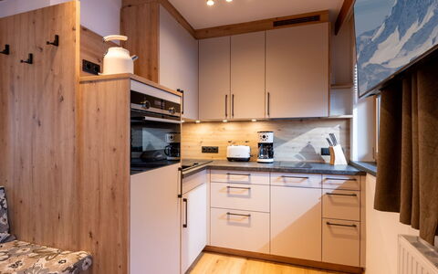 Niederau 26: Wood, Kitchen, Furniture, Countertop, Major Appliance, Interior Design, Cabinetry, Kitchen Appliance, Room, Sink