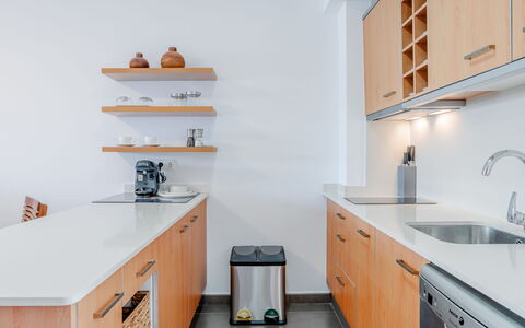 Las Dunas Oliva Nova: Countertop, Kitchen, Cabinetry, Interior Design, Flooring, Furniture, Wood, Kitchen Appliance, Floor, Home
