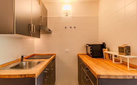 Vallesinella: Countertop, Kitchen, Flooring, Cabinetry, Interior Design, Floor, Wood, Ceiling, Kitchen Appliance, Major Appliance