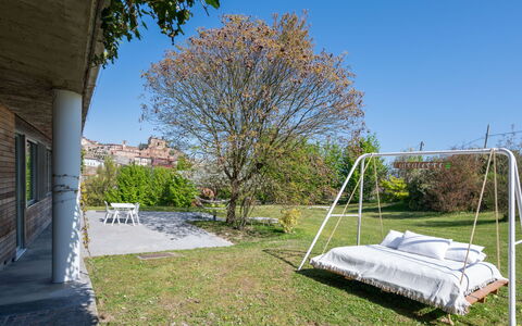 Stordita: Furniture, Garden, Outdoor Furniture, Lawn, Chair, Shade, Park, Yard, Backyard, Landscaping