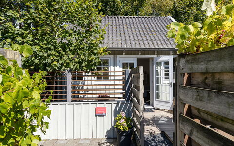 Residence Domburg: House, Shrub, Home, Door, Flowerpot, Cottage, Shade, Garden, Siding