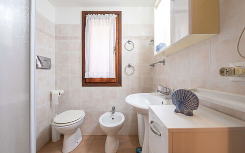 Casa ai Mandorli: Toilet Seat, Plumbing Fixture, Toilet, Bathroom, Flooring, Bathroom Sink, Sink, Floor, Interior Design, Tap