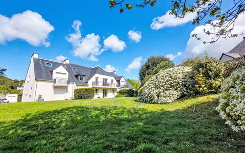 Les Demeures du Parc: Blue, Shrub, Residential Area, Home, Estate, Garden, Cottage, Lawn, Landscaping, Suburb
