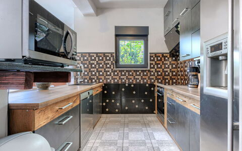 Acquila: Kitchen, Countertop, Major Appliance, Kitchen Appliance, Interior Design, Flooring, Kitchen Stove, Cabinetry, Ceiling, Floor