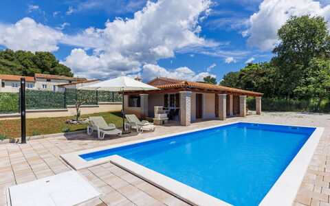 Santina: Blue, Swimming Pool, Resort, Composite Material, Leisure, Eco Hotel, Estate, Shade, Outdoor Furniture, Umbrella
