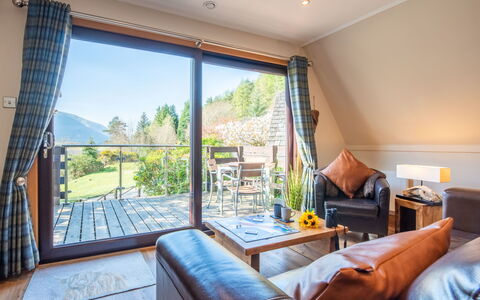 Sandpiper Lodge: Wood, Furniture, Table, Flooring, Chair, Home, Kitchen & Dining Room Table, Hardwood, Living Room, Wood Flooring