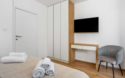 Larus: Interior Design, Flooring, Wood, Furniture, Floor, Bedroom, Room, Bed, Wood Flooring, Lighting