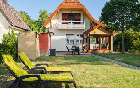 Sundown Beach: House, Home, Residential Area, Roof, Cottage, Shade, Estate, Garden, Lawn, Yard