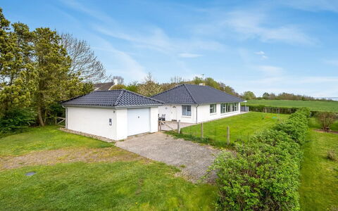 Christan - 350M from the Sea: House, Home, Door, Roof, Cottage, Estate, Garden, Shade, Siding, Yard
