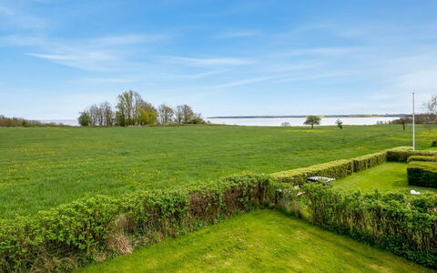Christan - 350M from the Sea: House, Home, Door, Roof, Cottage, Estate, Garden, Shade, Siding, Yard