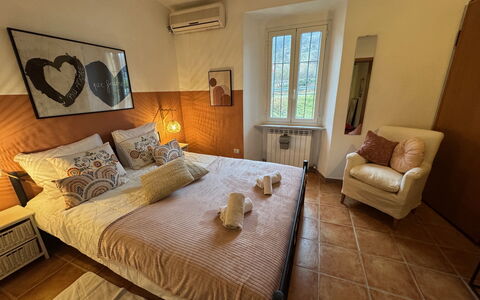 Cottage Wisteria: Furniture, Wood, Floor, Flooring, Bedroom, Interior Design, Bed, Linens, Room, Lighting