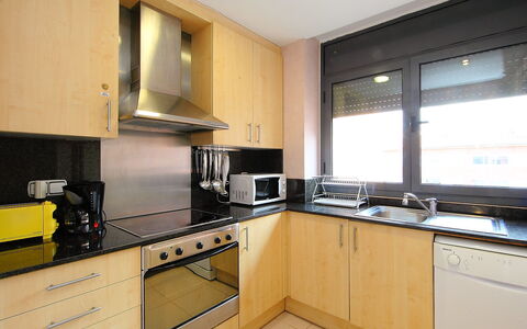 Tramuntana: Property, Countertop, Room, Kitchen, Cabinetry, Furniture, Building, Yellow, Interior Design, Real Estate