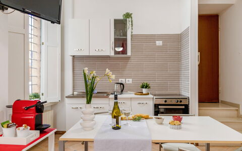 Movie Suite Jesi: Furniture, Interior Design, Kitchen, Flooring, Wood, Kitchen Appliance, Major Appliance, Floor, Chair, Home Appliance
