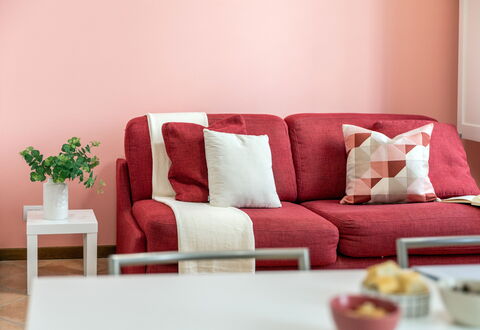 Movie Suite Jesi: Red, Furniture, Pink, Interior Design, Room, Throw Pillow, Cushion, Pillow, Living Room, Paint