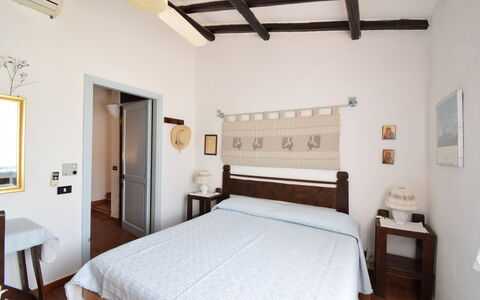 Villetta Oasi Belvedere, Budoni, Wifi, Ac: Furniture, Interior Design, Wall, Bedroom, Wood, Bed, Flooring, Floor, Ceiling, Lighting
