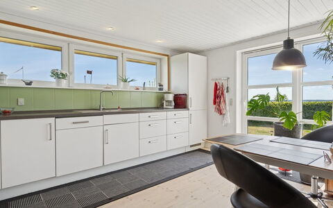 Erin - 200M from the Sea: Kitchen, Flooring, Interior Design, Countertop, Floor, Wood, Ceiling, Kitchen Appliance, Cabinetry, Furniture