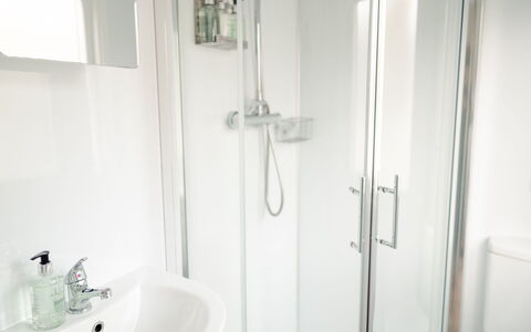 Lodge 8: Interior Design, Floor, Flooring, Room, Plumbing Fixture, Bathroom Sink, Bathroom, Sink, Bedroom, Linens
