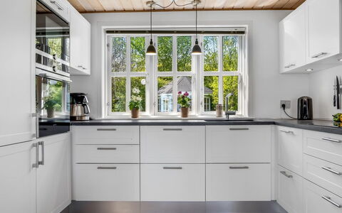 Welma - 200M from the Sea: Kitchen, Countertop, Cabinetry, Kitchen Appliance, Wood, Flooring, Interior Design, Major Appliance, Home, Drawer