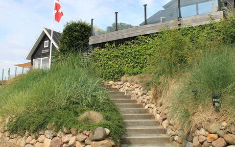 Valia - 20M from the Sea: Shrub, Rock, Plant Community, Groundcover, Slope, Garden, Landscaping, Shrubland, Walkway, Trail